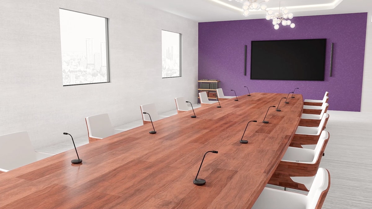 Foto mostrando uma sala equipada com microfones gooseneck