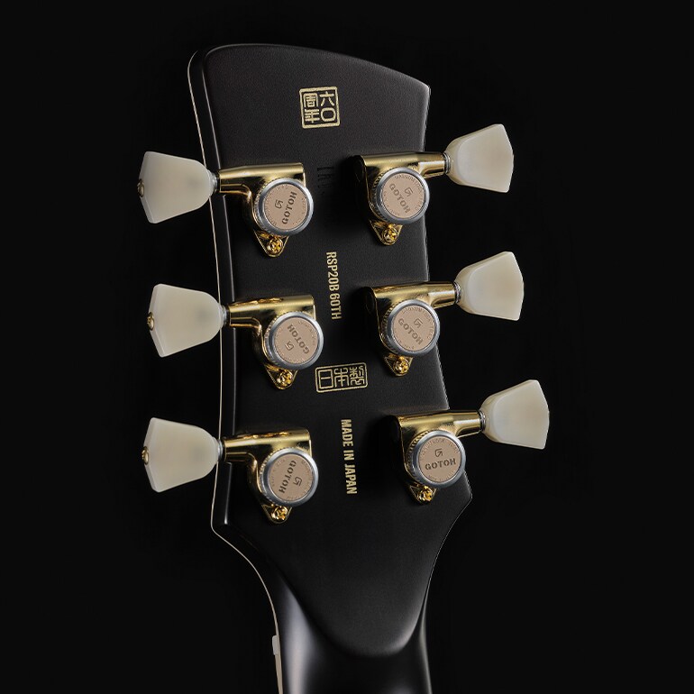 A parte traseira do headstock traz o carimbo 'Made in Japan' e um hanko especial de 60º aniversário.