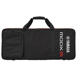 MODX M soft case placed horizontally, showing exterior shape and material texture.